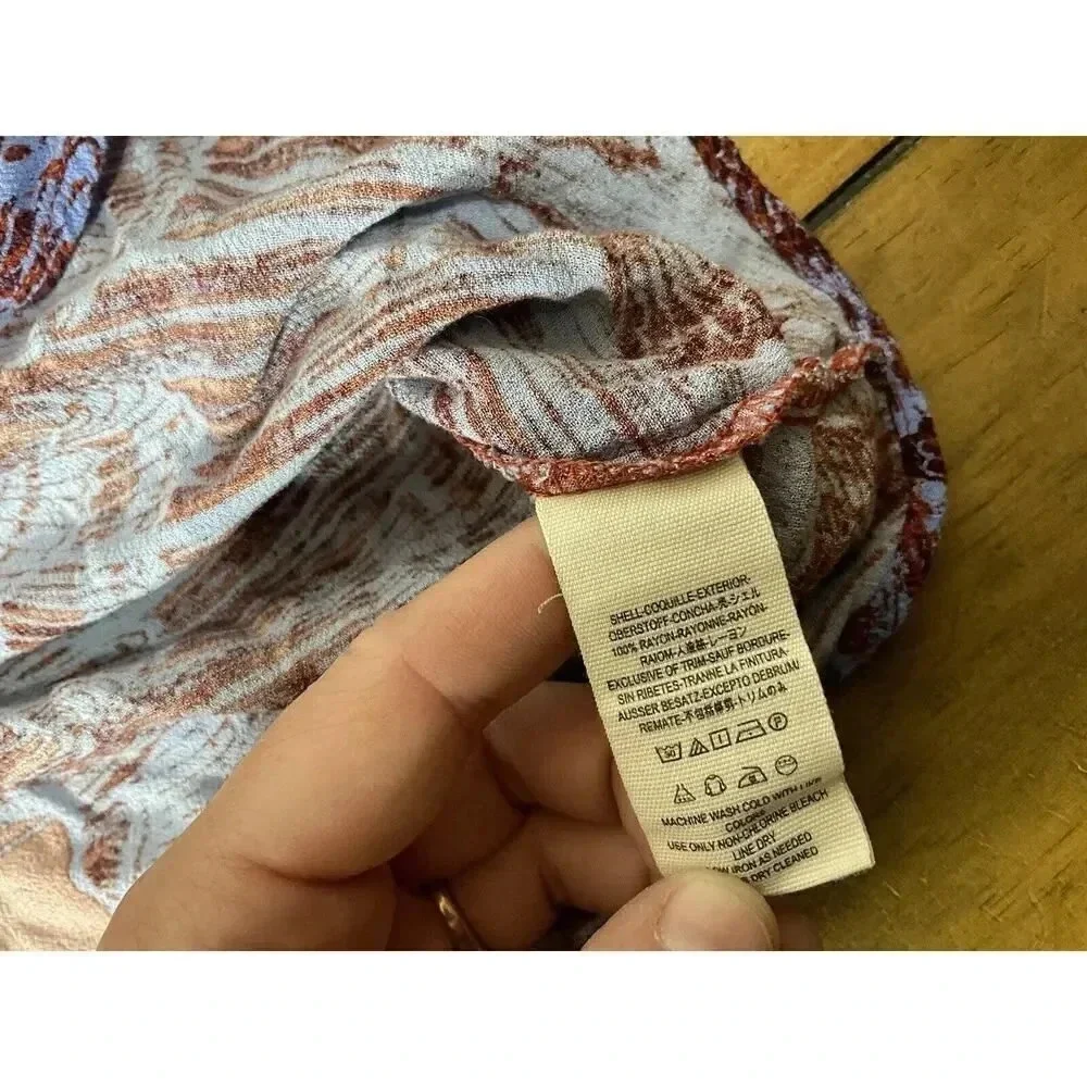 Free People Birds of a Feather Orange Floral Printed Blouse Size Small V-Neck